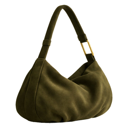 The Hob Sellenes handbag, made in premium green suede leather, with gold plated hardwear , handcrafted in europe in limited series