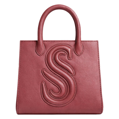 Sellenes Sally L peony pink luxury leather handbag with a large hand stitched logo design , handcrafted in Europe in limited series
