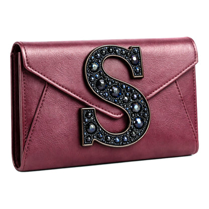 Valeya Luxury Sellenes clutch with Iconic , prominent black stone-encrusted Sellenes accesory made in red luxury lambskin leather